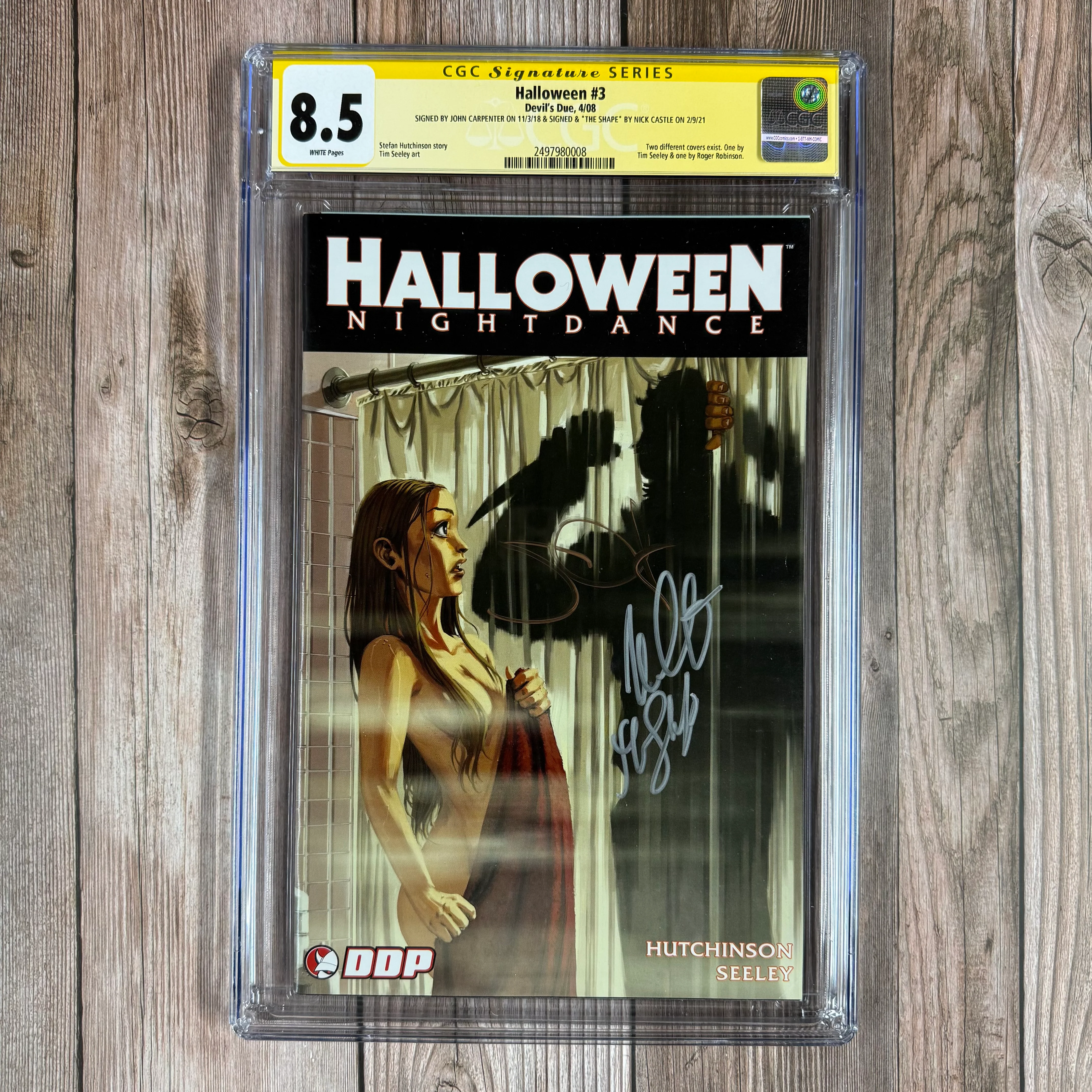 Halloween #3 CGC 8.5 WP SS Signed by John Carpenter & Nick Castle Cover art inspired by the film Psycho (cert:0008)